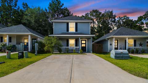 Photo of 16842 Marie Village Drive, Conroe, TX 77306 (MLS # 97372646)