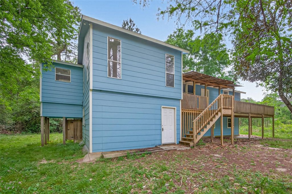 Photo of 21146 Caney Drive, New Caney, TX 77357 (MLS # 76950553)