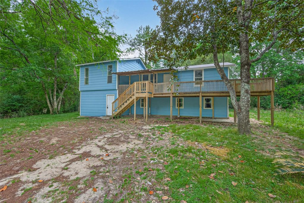 Photo of 21146 Caney Drive, New Caney, TX 77357 (MLS # 76950553)
