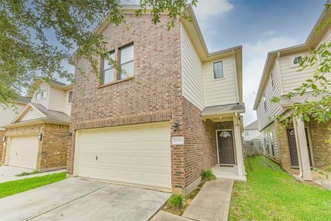 Photo of 6643 Sharpstone Creek Lane, Houston, TX 77084 (MLS # 98439040)