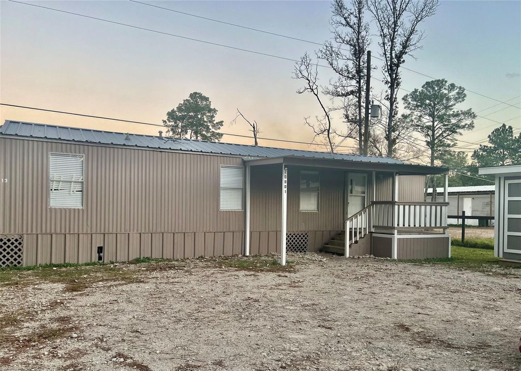 Photo of 20805 S Navasota Drive, New Caney, TX 77357 (MLS # 10864558)