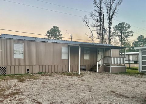 Photo of 20805 S Navasota Drive, New Caney, TX 77357 (MLS # 10864558)