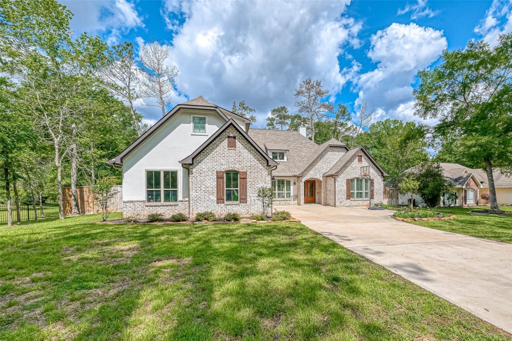 Photo of 2407 Chantilly Lane Lane, Conroe, TX 77384 (MLS # 71500912)