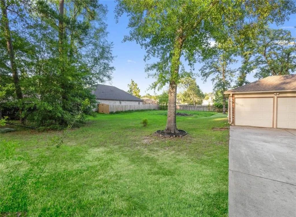 Photo of 28914 Champion Oaks Drive, Magnolia, TX 77354 (MLS # 94431244)