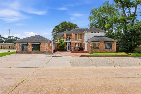Photo of 13700 Lakewood Forest Drive, Houston, TX 77070 (MLS # 25838854)