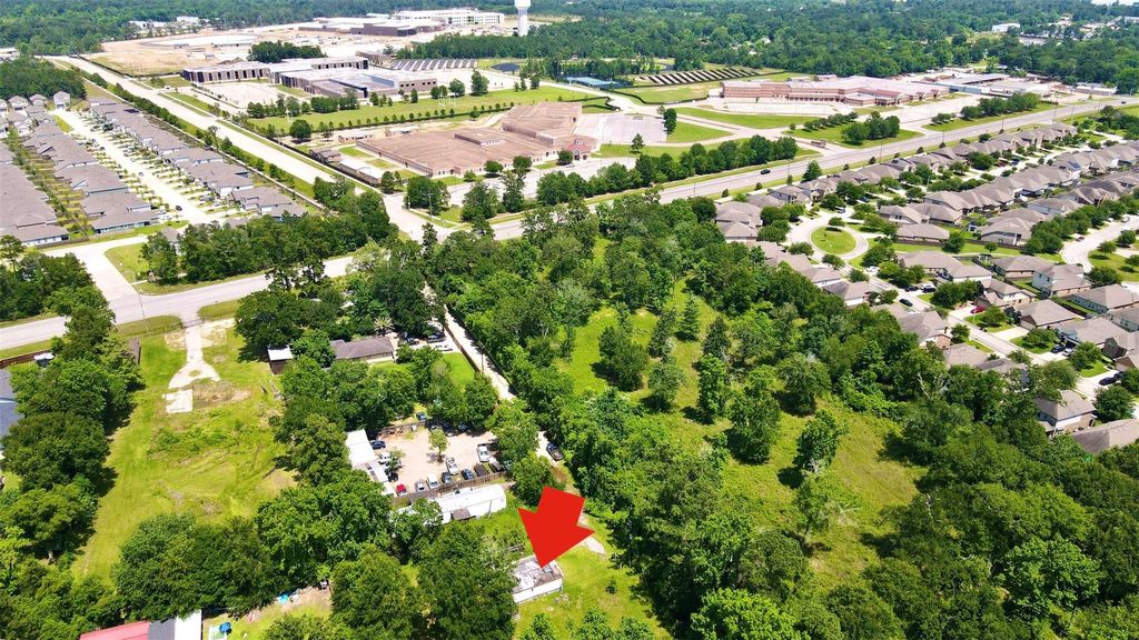 Photo of 833 Beach Airport Road, Conroe, TX 77301 (MLS # 95441691)