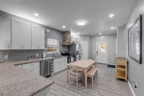 Photo of 713 Mcintosh Street, Houston, TX 77009 (MLS # 41253388)