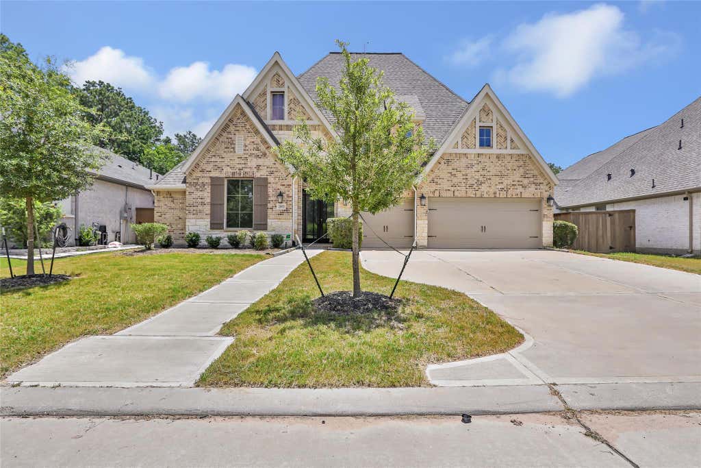Photo of 21873 Otter Point Lane, Porter, TX 77365 (MLS # 28665062)