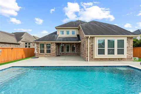 Photo of 934 Windy Garden Way, Richmond, TX 77406 (MLS # 42638428)