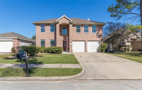 Photo of 405 Mystic Trail Loop, Houston, TX 77339 (MLS # 77144778)