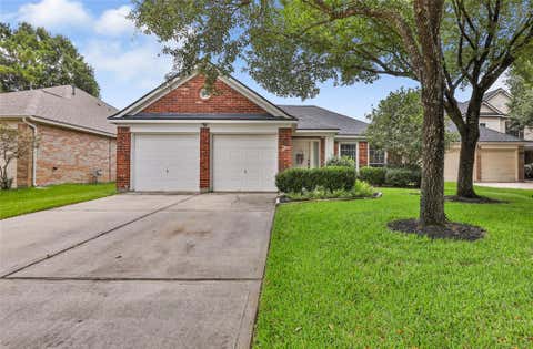 Photo of 26868 Iron Manor Lane, Kingwood, TX 77339 (MLS # 93439799)