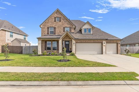 Photo of 9718 Colonial Downs Drive, Mont Belvieu, TX 77523 (MLS # 80874090)