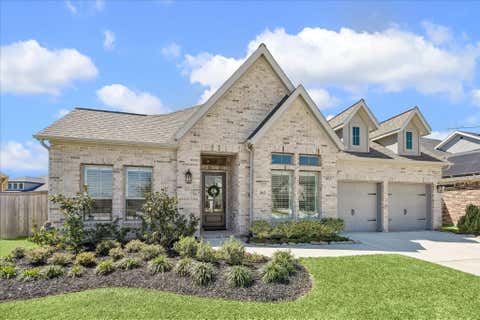 Photo of 20615 Strider Gate Lane, Tomball, TX 77377 (MLS # 32564677)