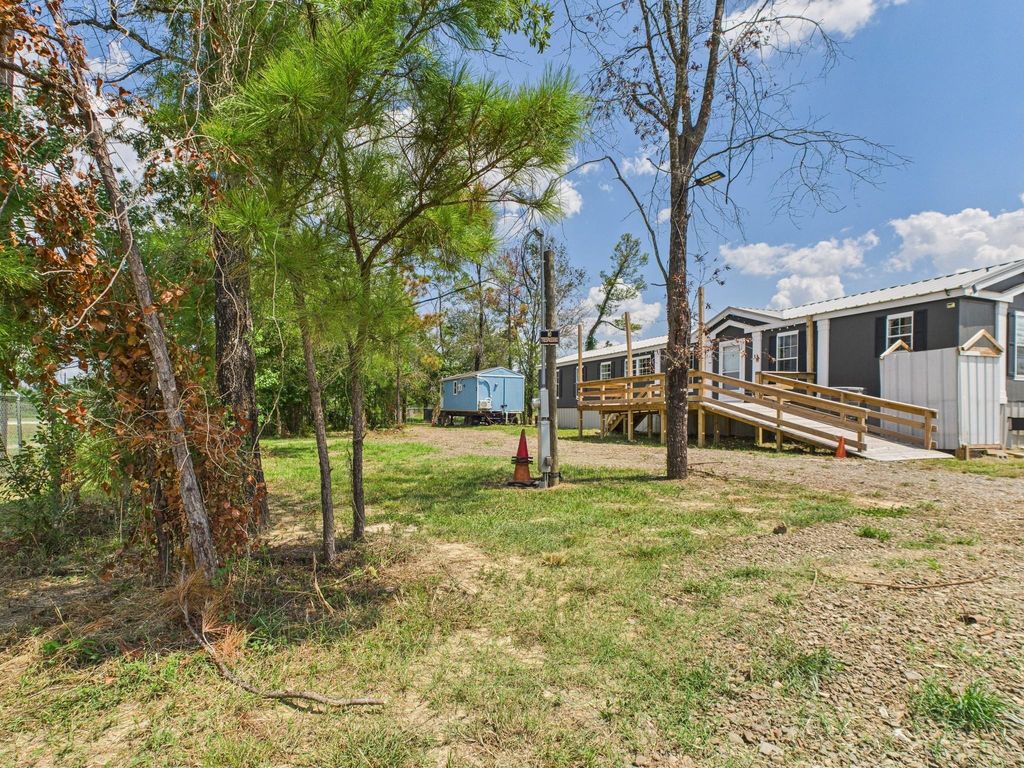 Photo of 12418 N Lake Houston Parkway, Houston, TX 77044 (MLS # 48570891)