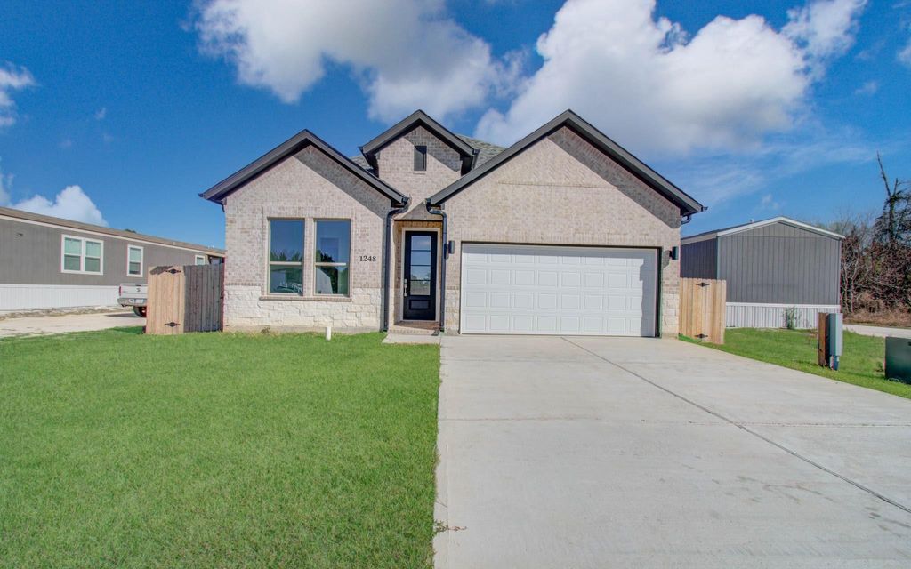 Photo of 1248 Road 5802, Cleveland, TX 77327 (MLS # 25480960)