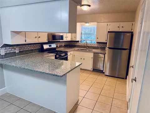 Photo of 501 Waco Street #4, Conroe, TX 77301 (MLS # 67801103)