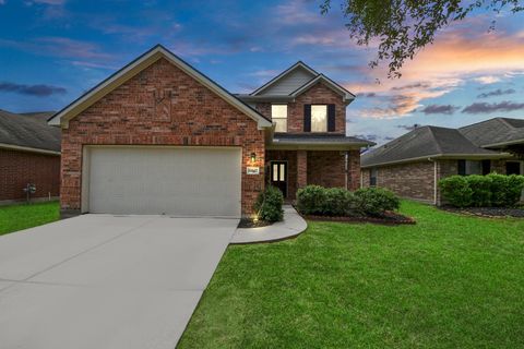 Photo of 10342 Whisper Bluff Drive, Humble, TX 77396 (MLS # 58270900)