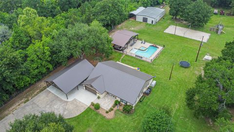 Photo of 306 County Road 3997, Cleveland, TX 77328 (MLS # 60237352)
