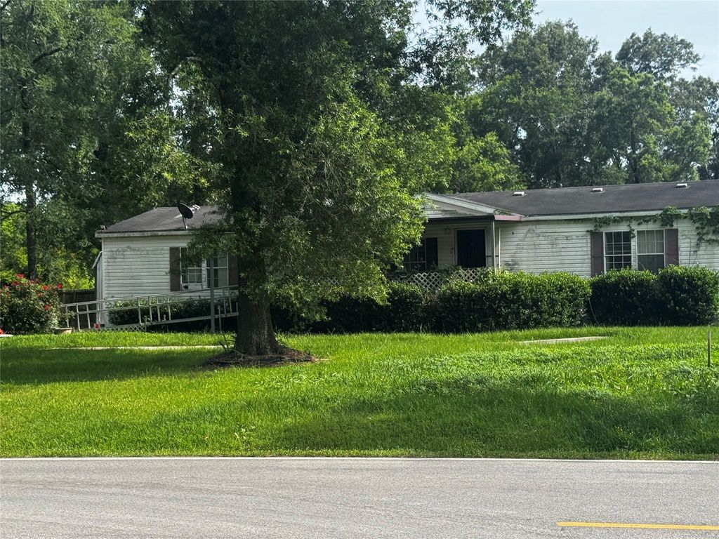 Photo of 11403 Walraven Drive, Huffman, TX 77336 (MLS # 17036461)