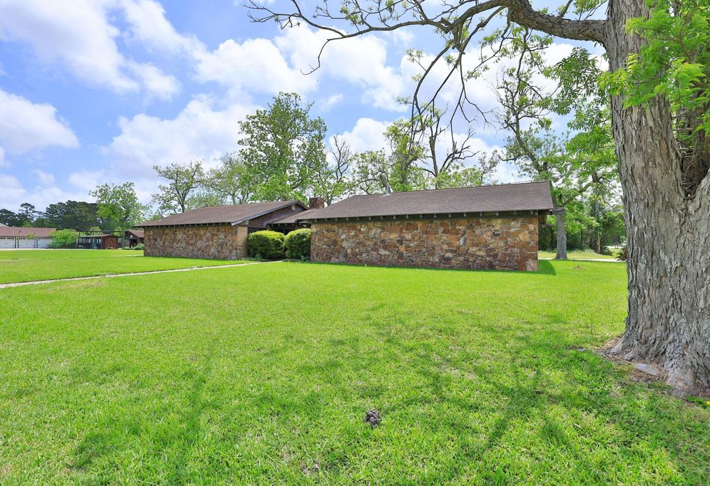 Photo of 7807 Pecan Forest Lane, Baytown, TX 77521 (MLS # 46314182)