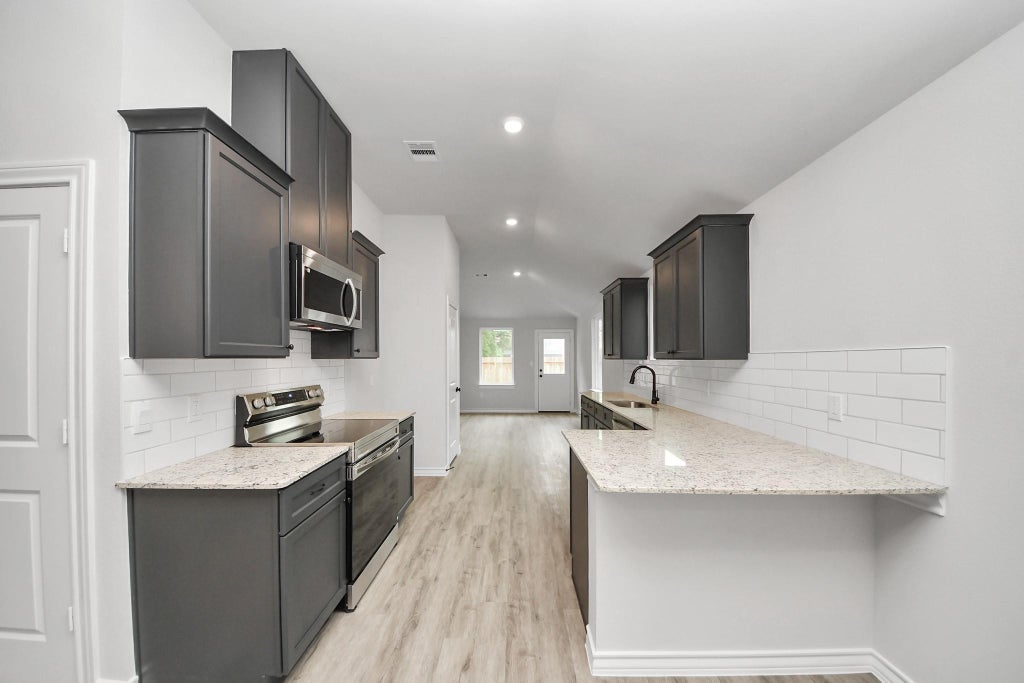 Photo of 18728 Loom Drive, Conroe, TX 77306 (MLS # 88063658)