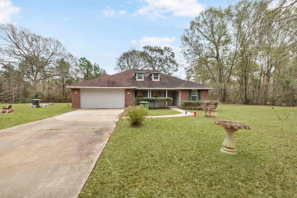 Photo of 23 Fm 2296 Road, Huntsville, TX 77340 (MLS # 36259026)