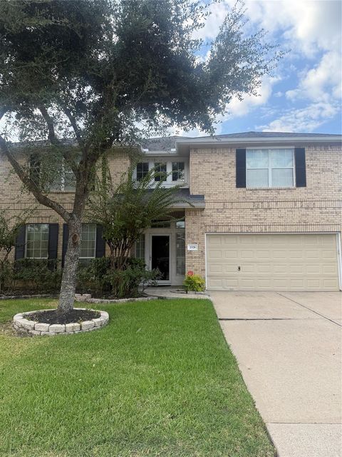 Photo of 2328 Shadow Falls Lane, Pearland, TX 77584 (MLS # 32171490)