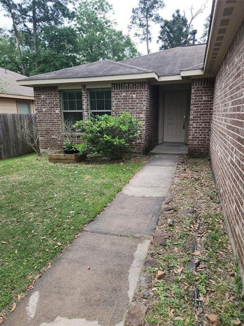 Photo of 818 Lightningbug Lane, Conroe, TX 77301 (MLS # 83075194)