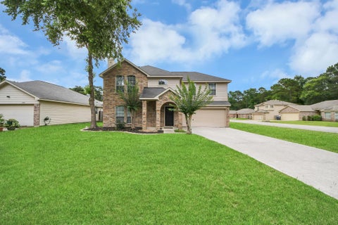 Photo of 13880 Broken Arrow Drive, Willis, TX 77378 (MLS # 82032742)