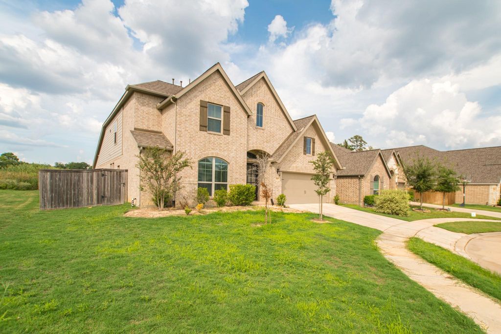 Photo of 9430 Stablewood Lakes Lane, Tomball, TX 77375 (MLS # 51690967)