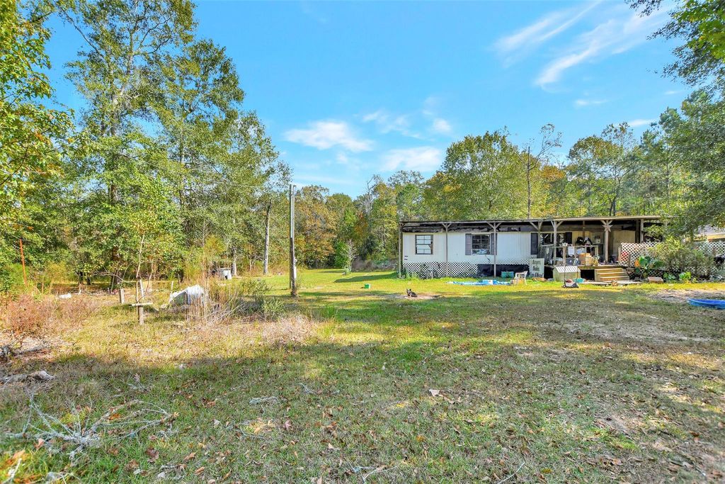 Photo of 111 Bonnie Creek Dr, Coldspring, TX 77331 (MLS # 8726885)