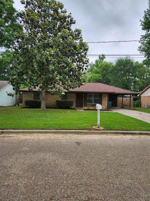 Photo of 205 N Forest Drive, Willis, TX 77378 (MLS # 22818195)
