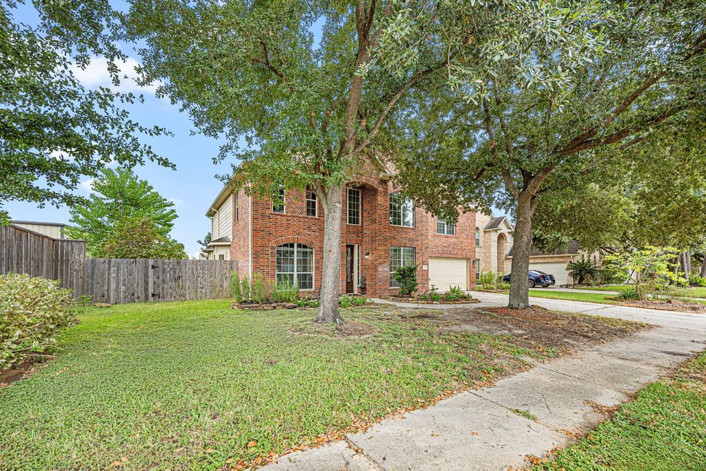 Photo of 25993 N Royal Emerald Ln Ln, Kingwood, TX 77339 (MLS # 64241175)