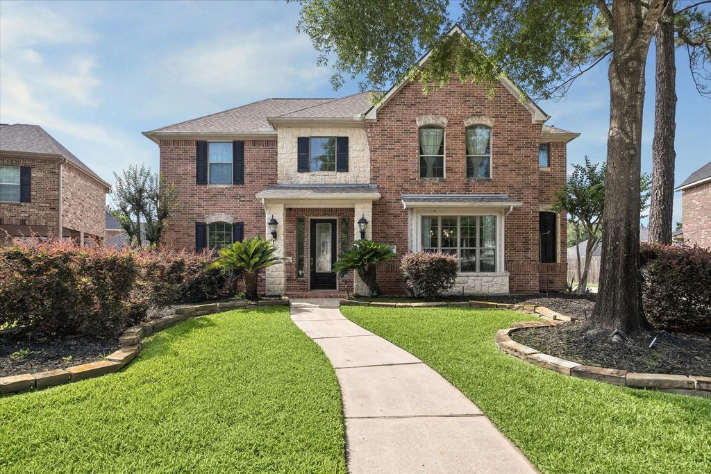 Photo of 15410 Stone Gables Lane, Houston, TX 77044 (MLS # 71853545)