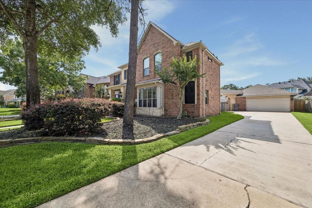 Photo of 15410 Stone Gables Lane, Houston, TX 77044 (MLS # 71853545)