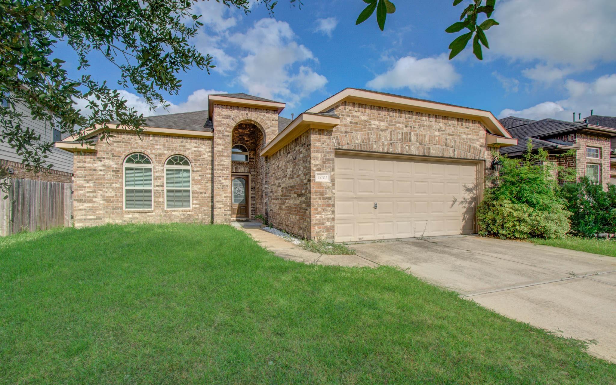 15702 Whisper Woods Drive