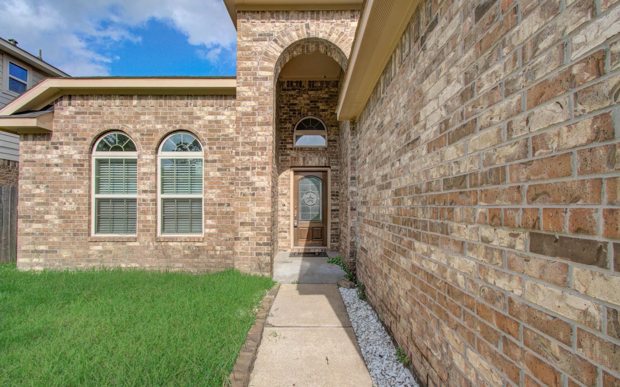 15702 Whisper Woods Drive