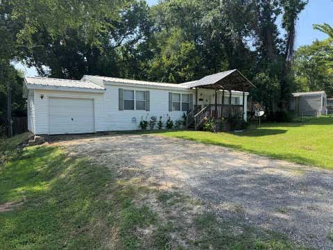 Photo of 15203 Paradise Cove Drive, Willis, TX 77318 (MLS # 29394439)