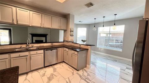 Photo of 14802 Belterraza Drive, Houston, TX 77083 (MLS # 48683387)