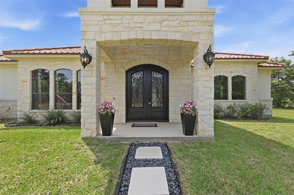 Photo of 10105 Heritage Ranch Road, Conroe, TX 77303 (MLS # 24334149)