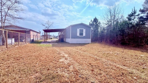 Photo of 886 Road 51023, Cleveland, TX 77327 (MLS # 36813355)