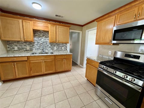 Photo of 8651 Flossie Mae Street, Houston, TX 77029 (MLS # 24076310)