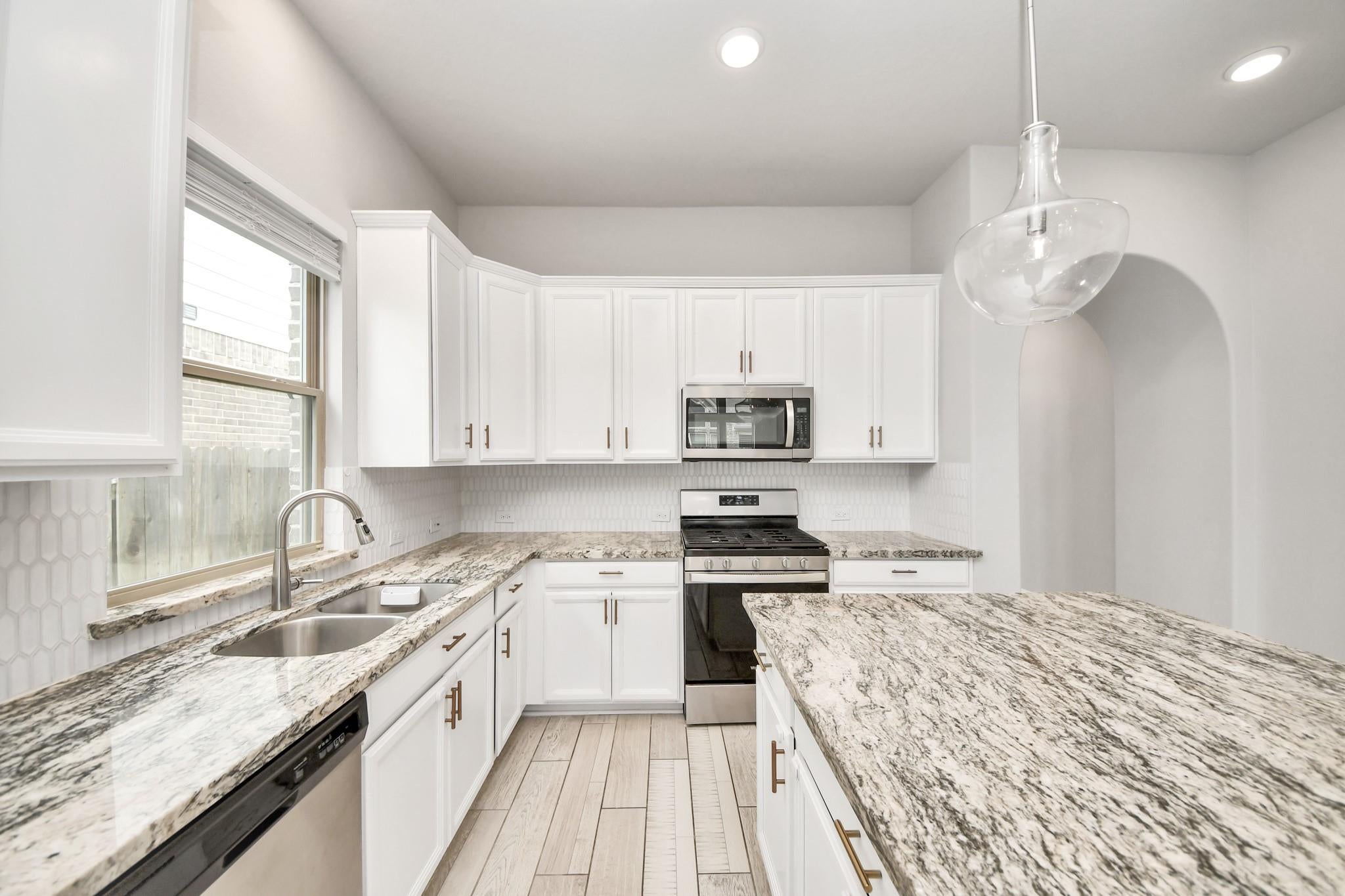 6006 Dovetail Cliff Court