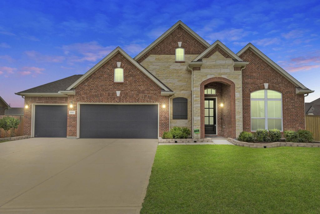 Photo of 9311 Secretariat Lane, Mont Belvieu, TX 77523 (MLS # 49804078)