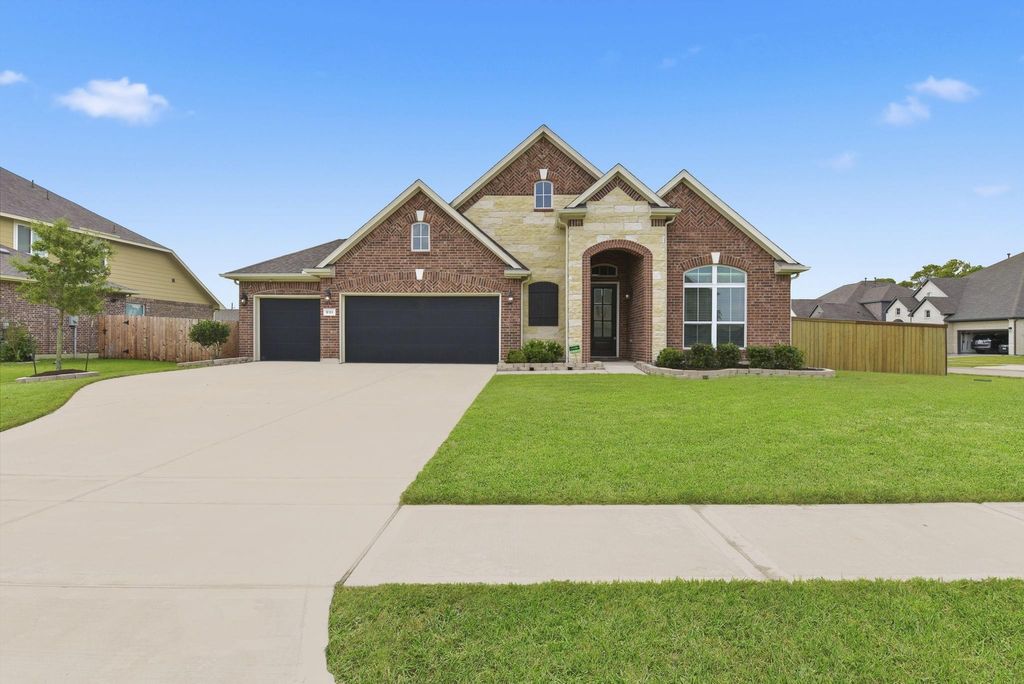 Photo of 9311 Secretariat Lane, Mont Belvieu, TX 77523 (MLS # 49804078)