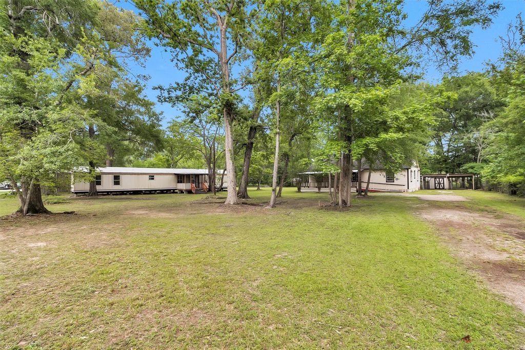 Photo of 19339 Forest Lane Circle, New Caney, TX 77357 (MLS # 57226183)