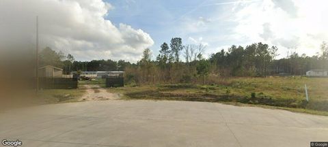 Photo of 222 County Road 5009, Cleveland, TX 77327 (MLS # 84944335)