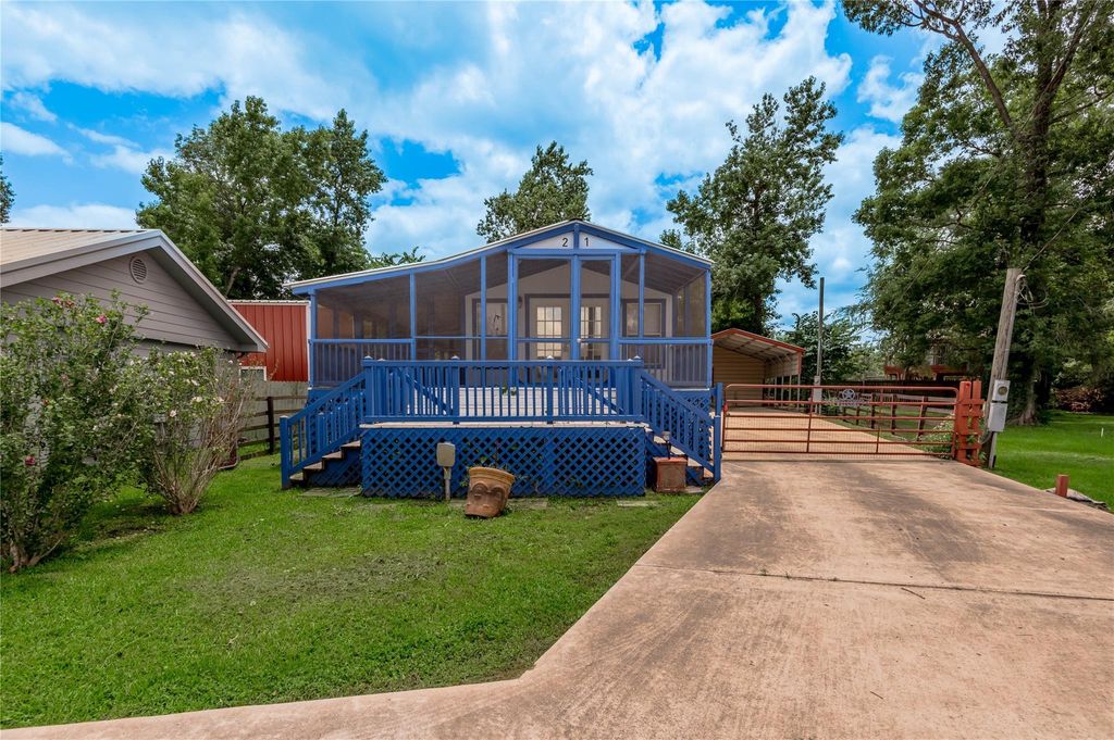 Photo of 21 Oahu Court, Point Blank, TX 77364 (MLS # 97142388)