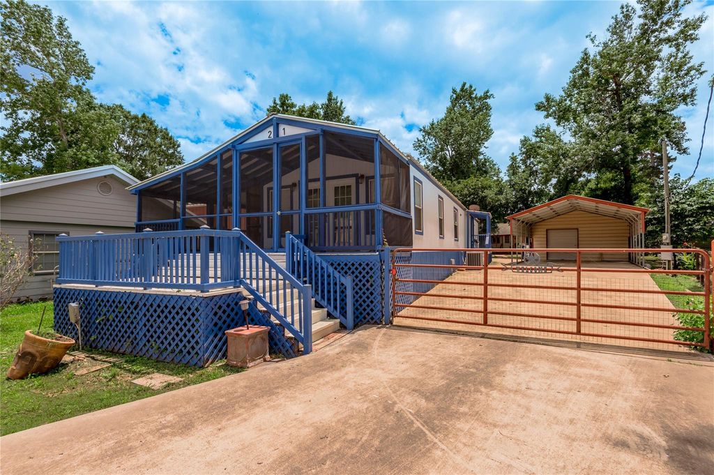 Photo of 21 Oahu Court, Point Blank, TX 77364 (MLS # 97142388)