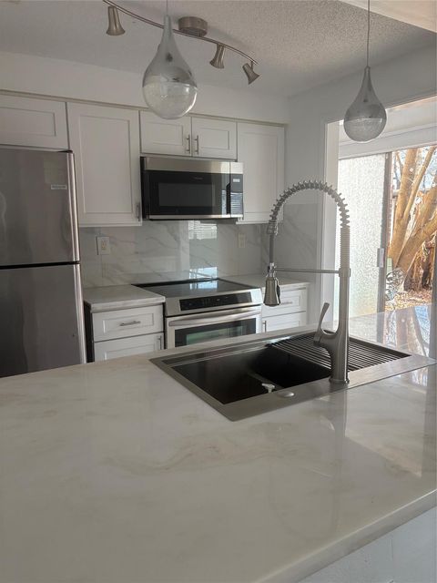 Photo of 10123 Waterstone Drive #39, Houston, TX 77042 (MLS # 34656062)